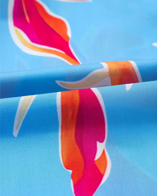 Floral Flutter Sleeve Blouse with Pompom Trim.