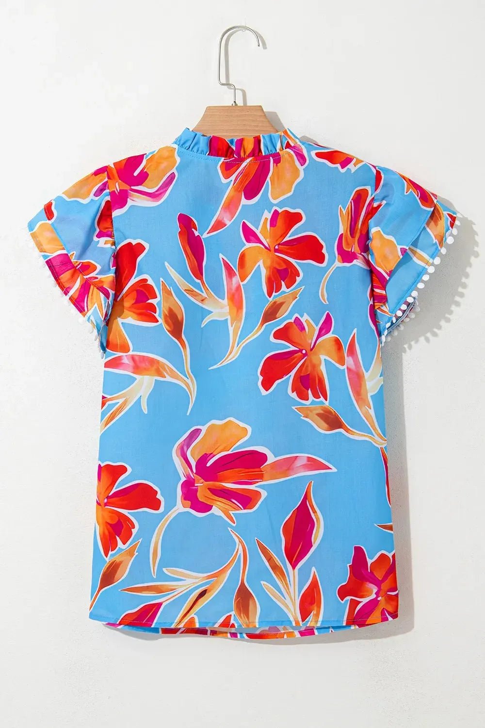 Floral Flutter Sleeve Blouse with Pompom Trim.