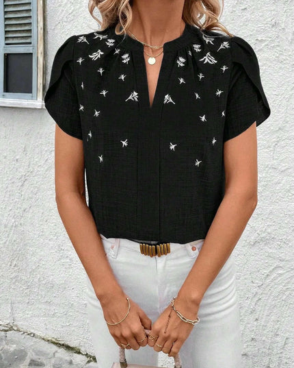 Floral Notched Short Sleeve Blouse.