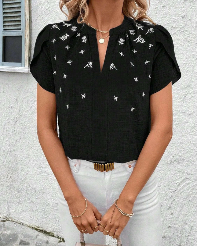 Floral Notched Short Sleeve Blouse.