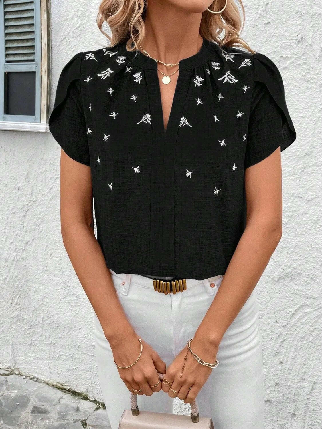 Floral Notched Short Sleeve Blouse.