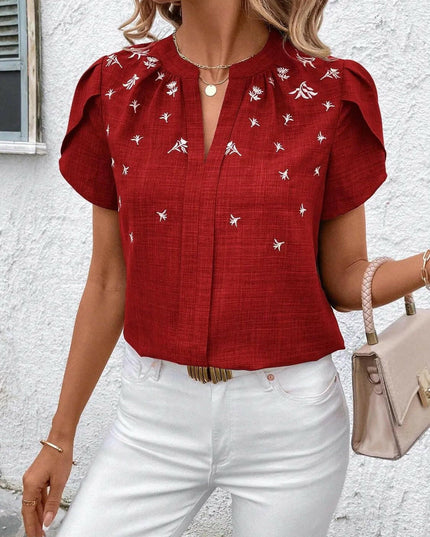 Floral Notched Short Sleeve Blouse.