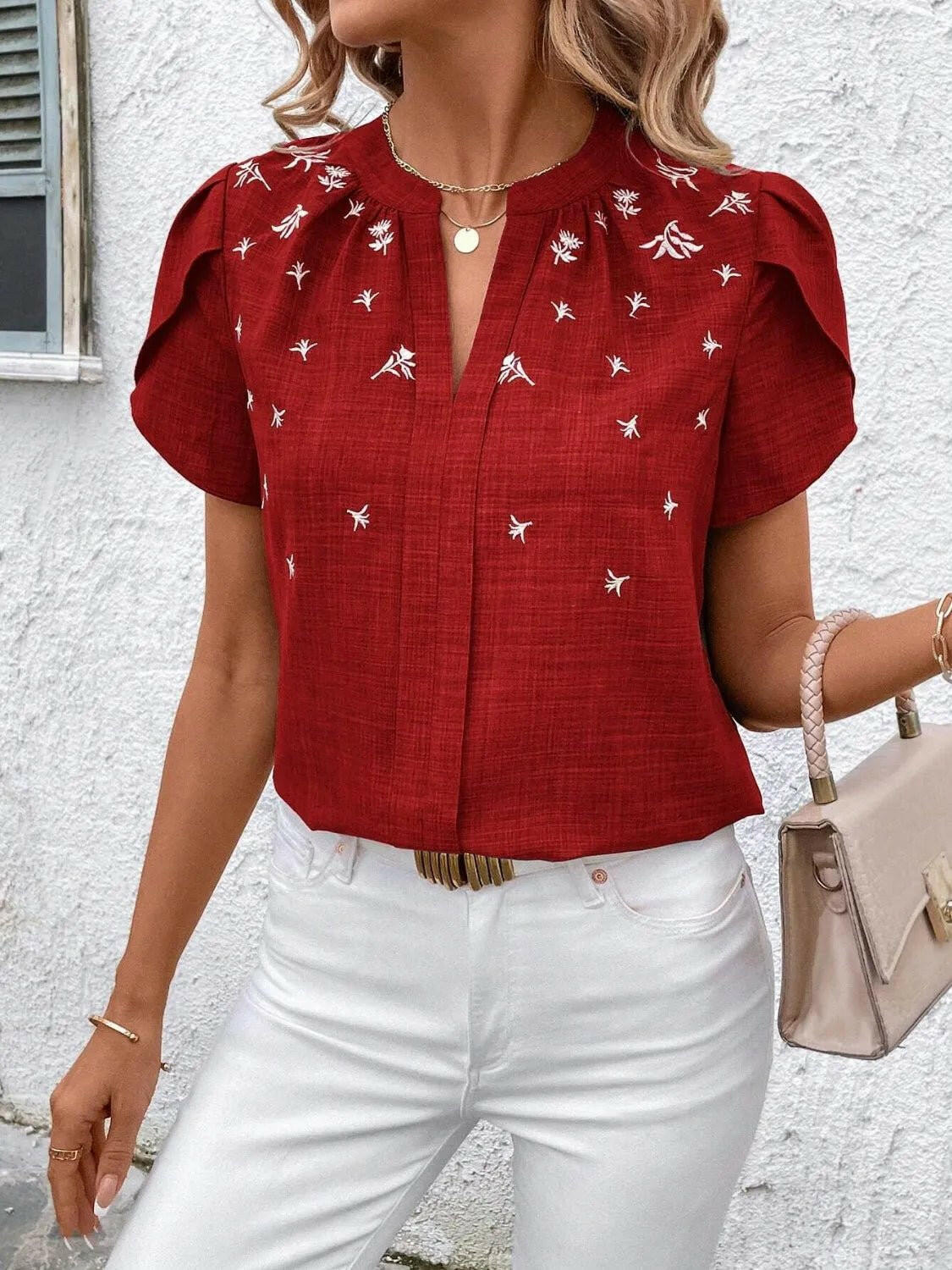 Floral Notched Short Sleeve Blouse.