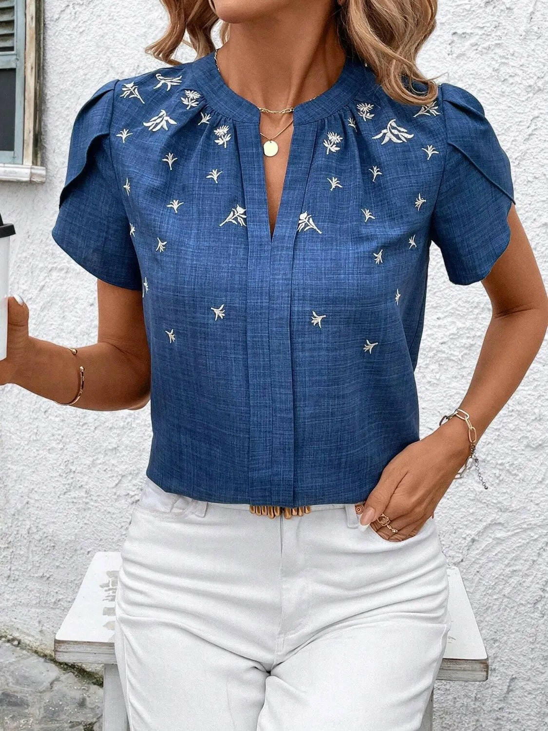 Floral Notched Short Sleeve Blouse.