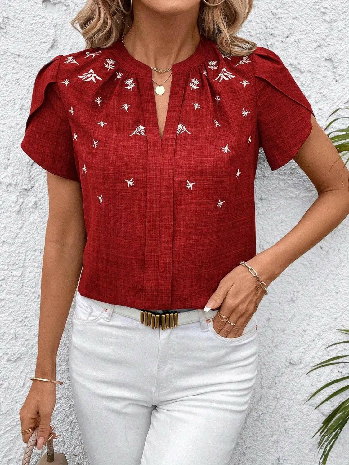Floral Notched Short Sleeve Blouse.