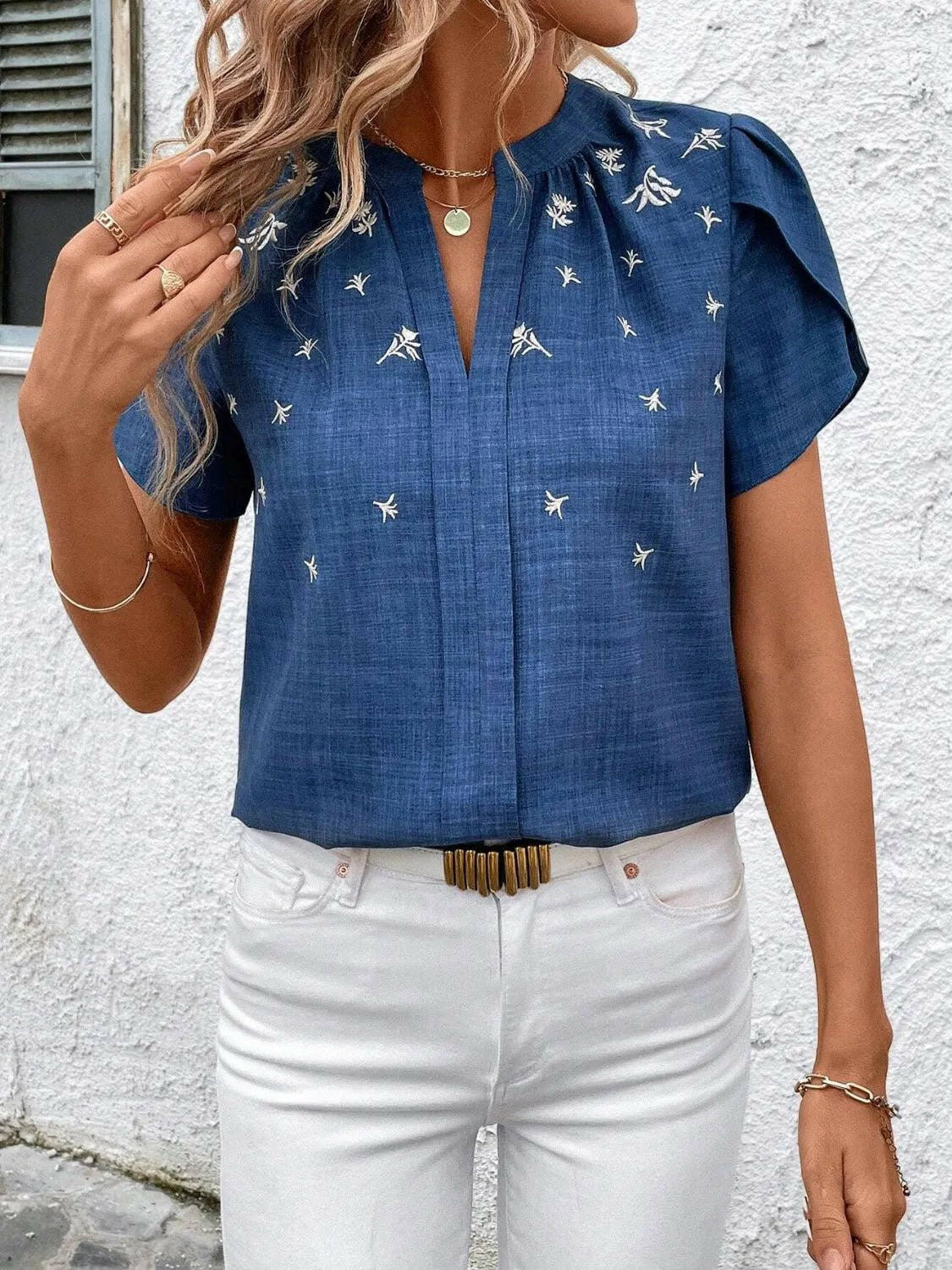 Floral Notched Short Sleeve Blouse.