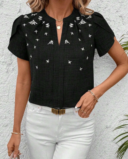 Floral Notched Short Sleeve Blouse.