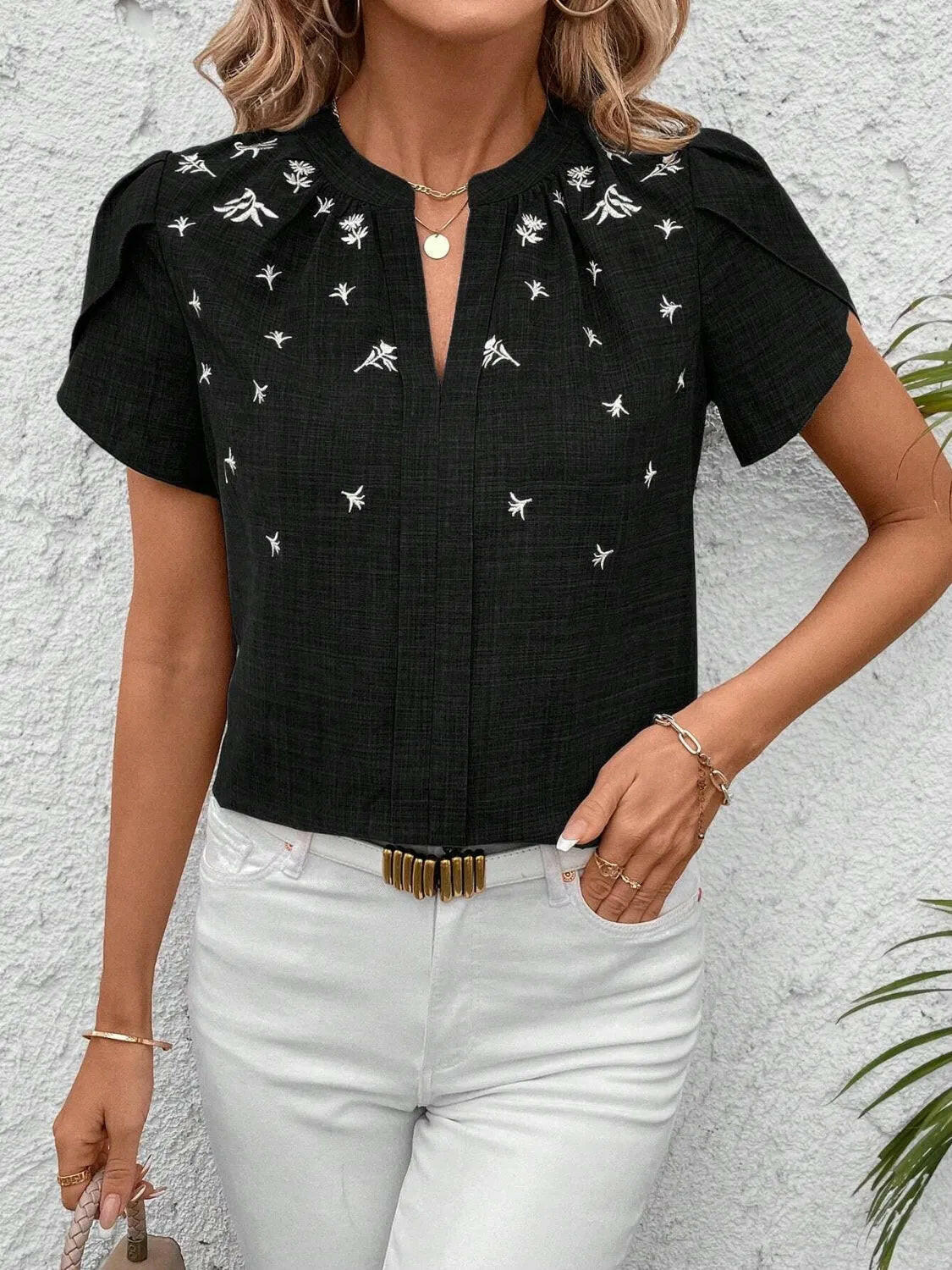 Floral Notched Short Sleeve Blouse.