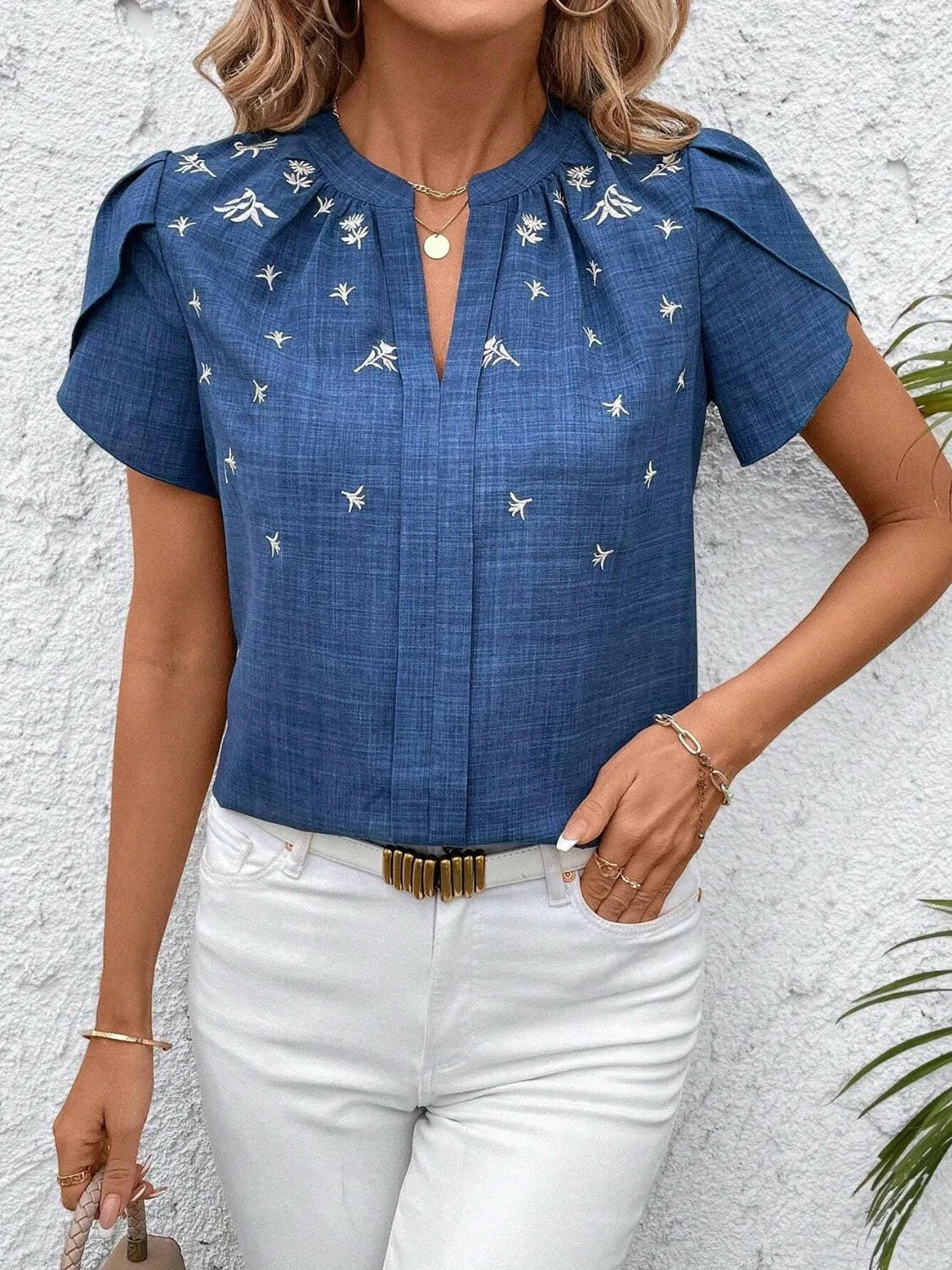 Floral Notched Short Sleeve Blouse.