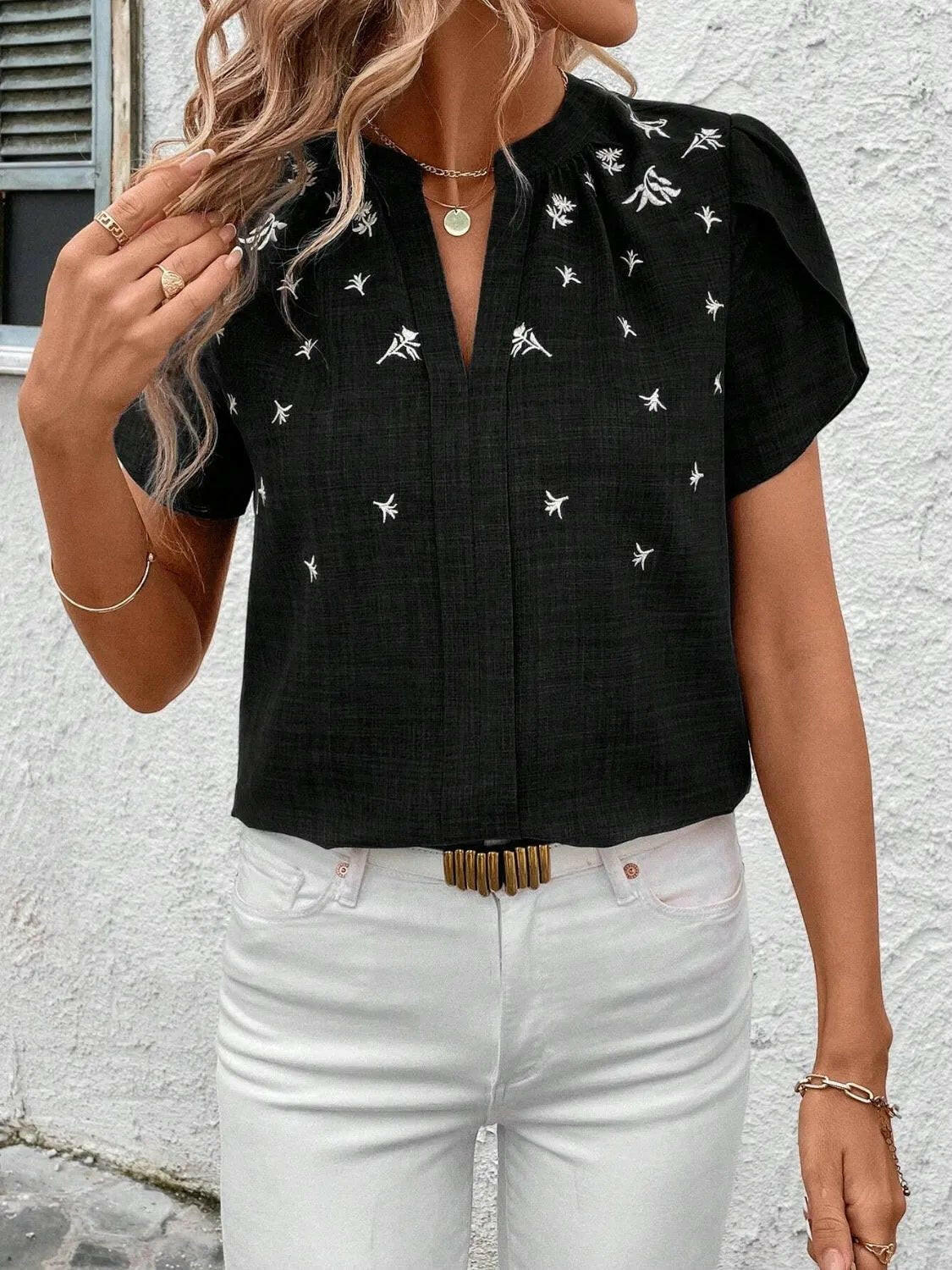 Floral Notched Short Sleeve Blouse.