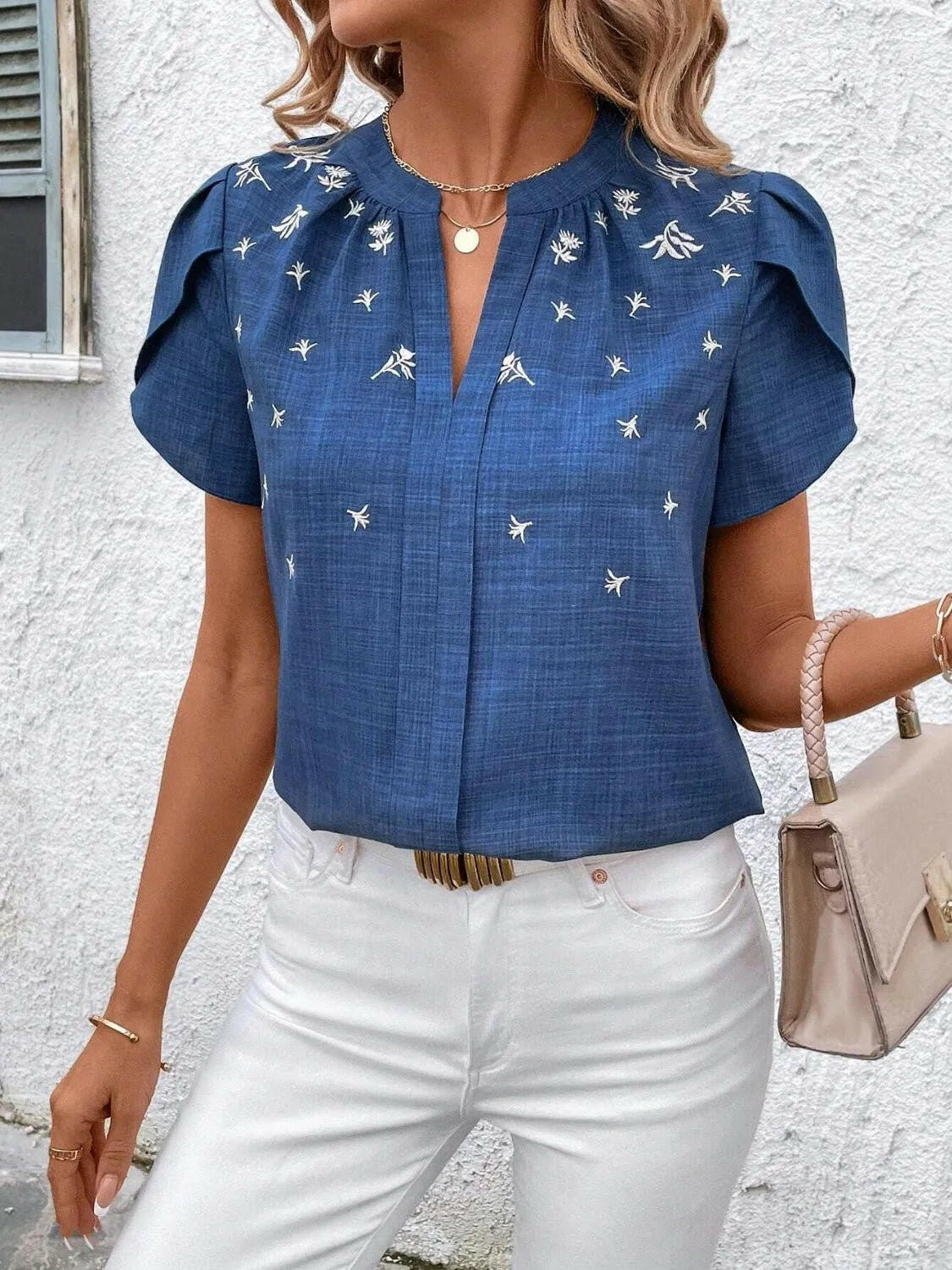 Floral Notched Short Sleeve Blouse.