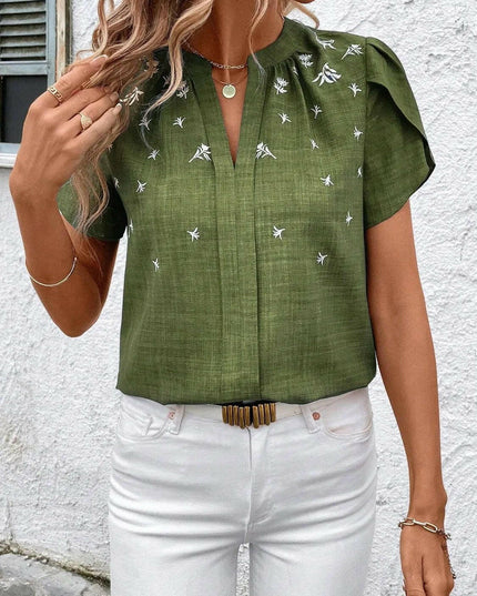 Floral Notched Short Sleeve Blouse.
