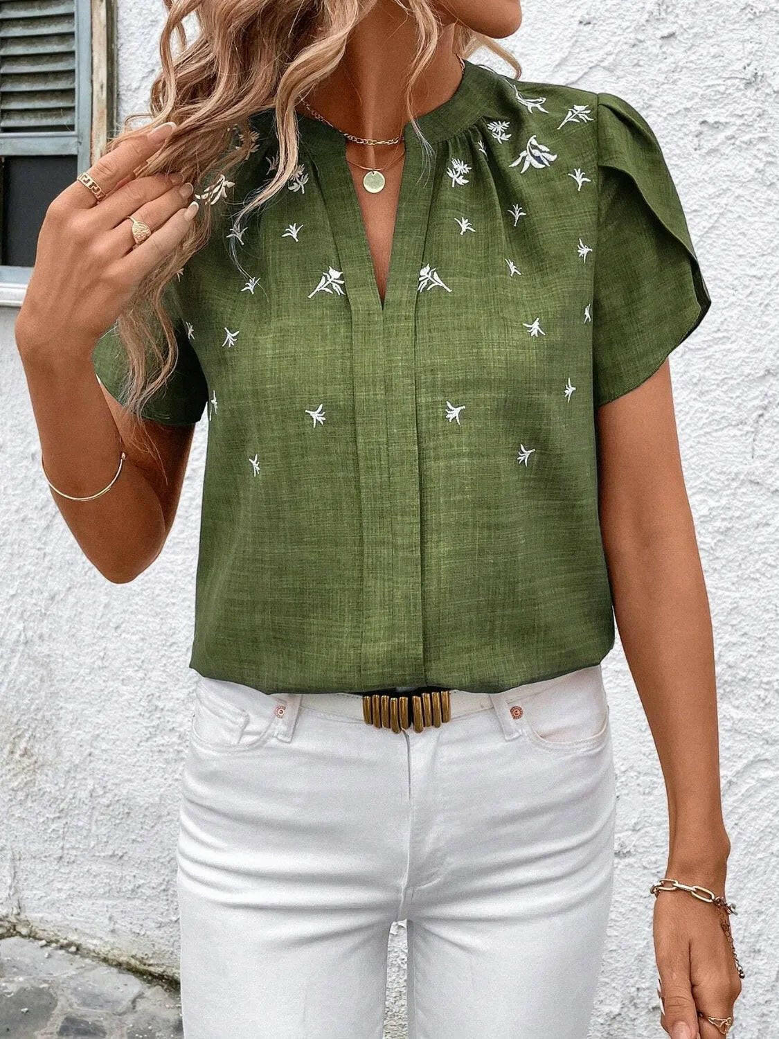 Floral Notched Short Sleeve Blouse.