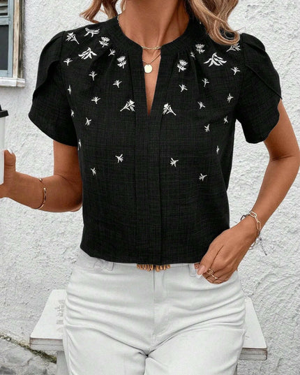 Floral Notched Short Sleeve Blouse.