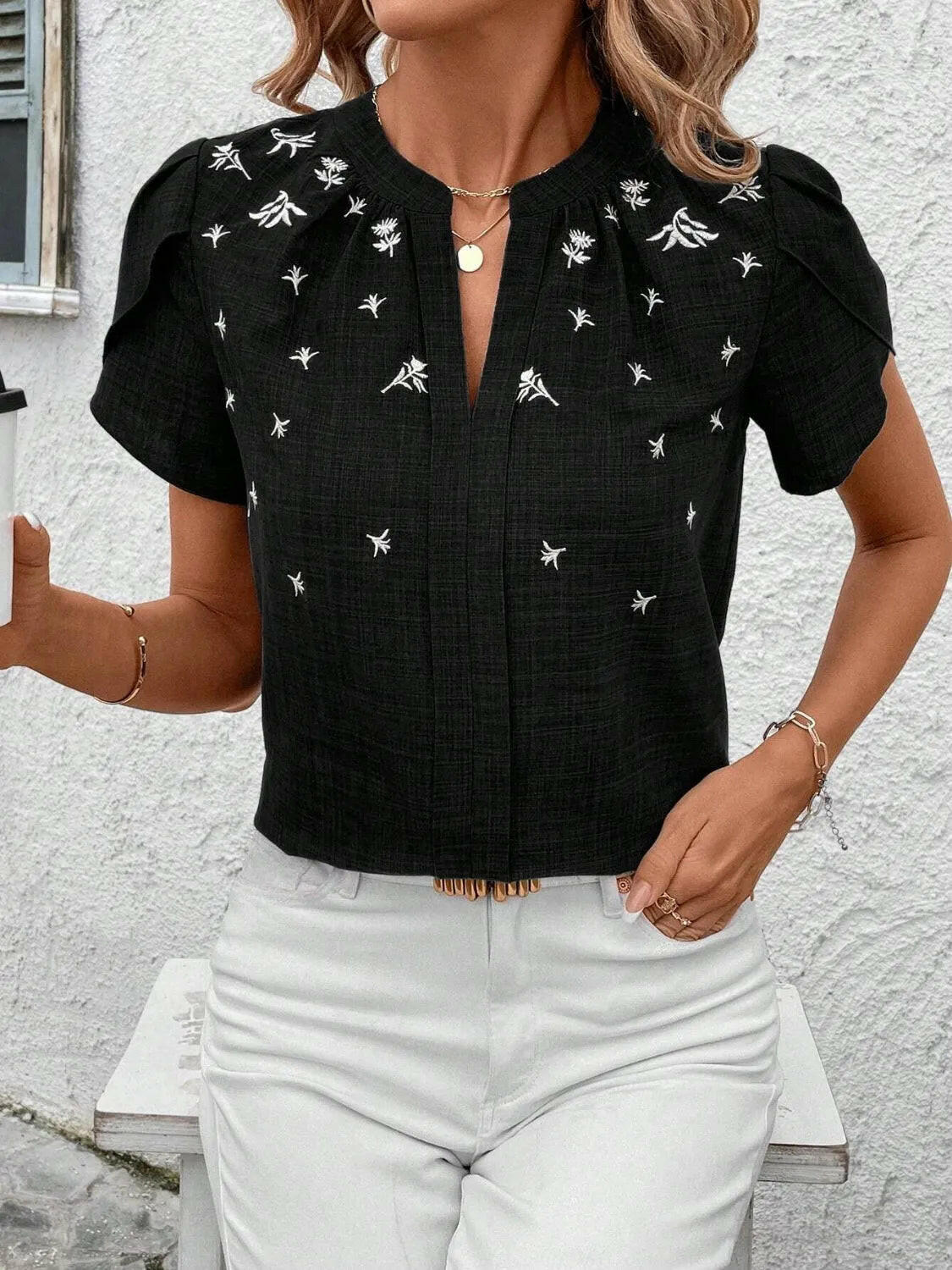 Floral Notched Short Sleeve Blouse.