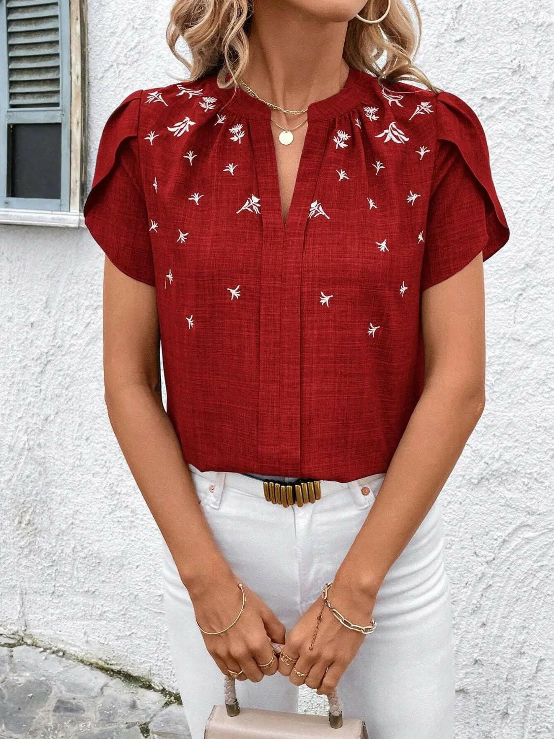 Floral Notched Short Sleeve Blouse.