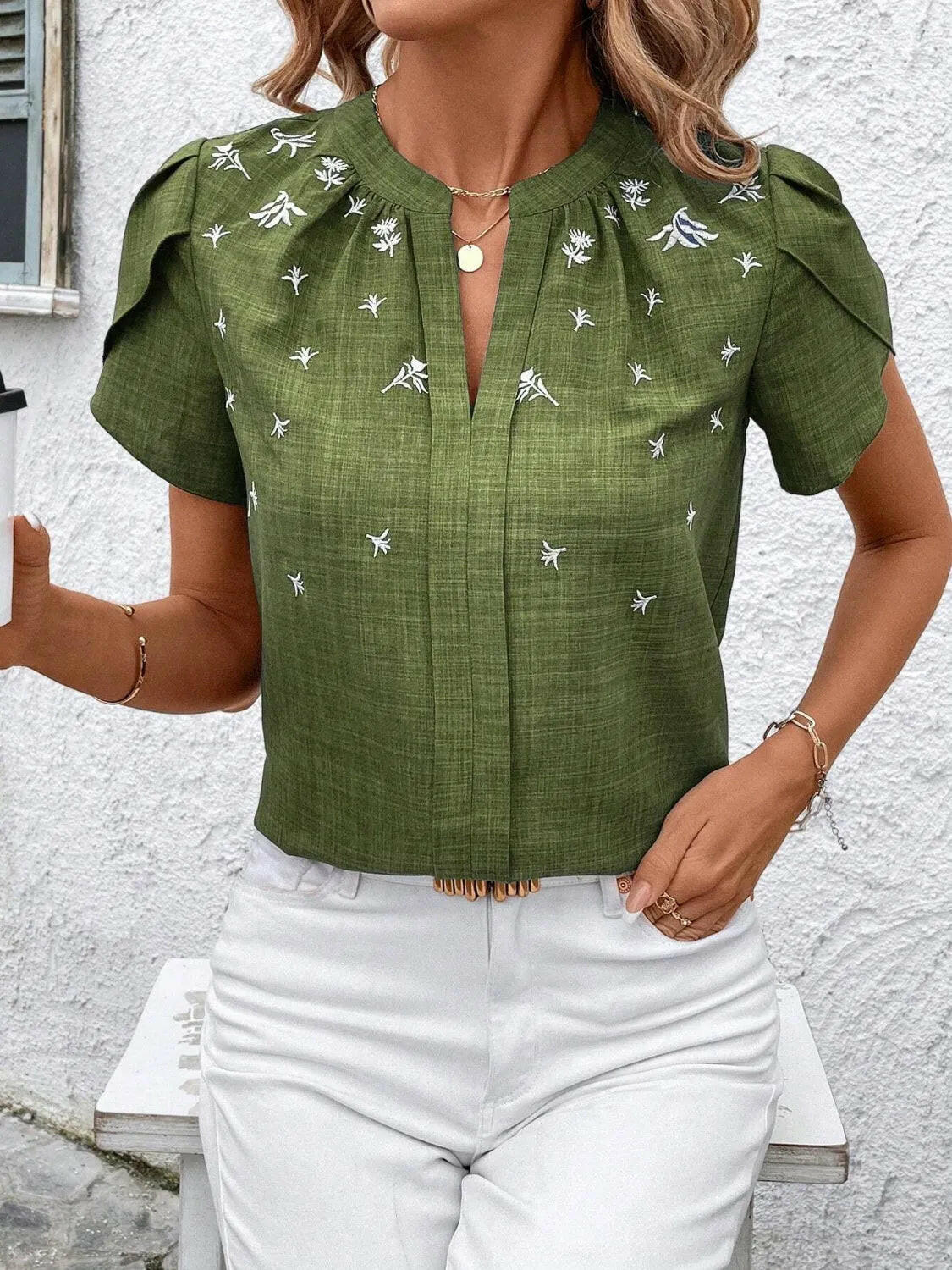 Floral Notched Short Sleeve Blouse.
