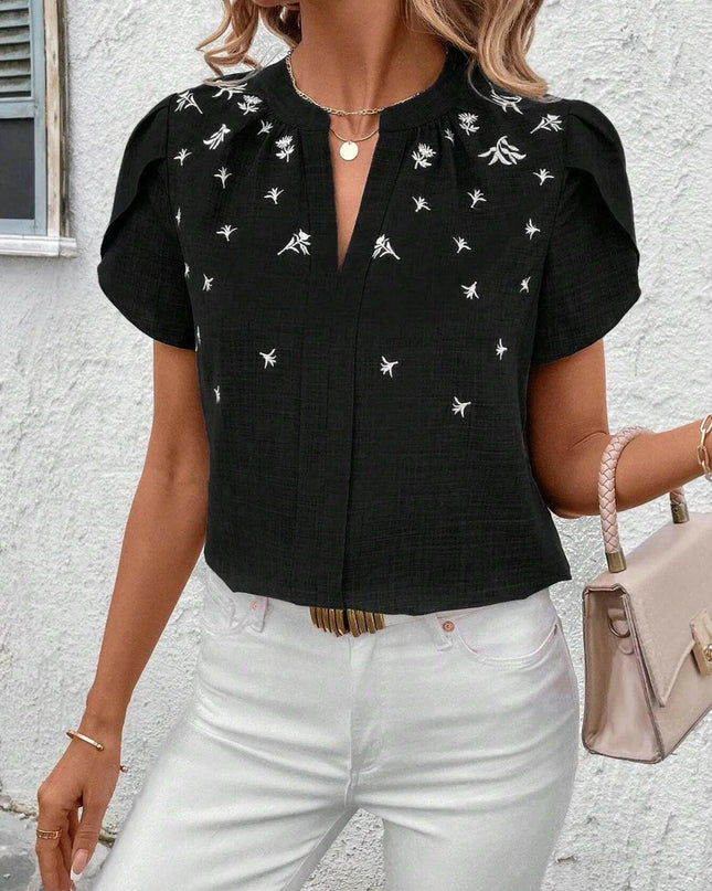 Floral Notched Short Sleeve Blouse.