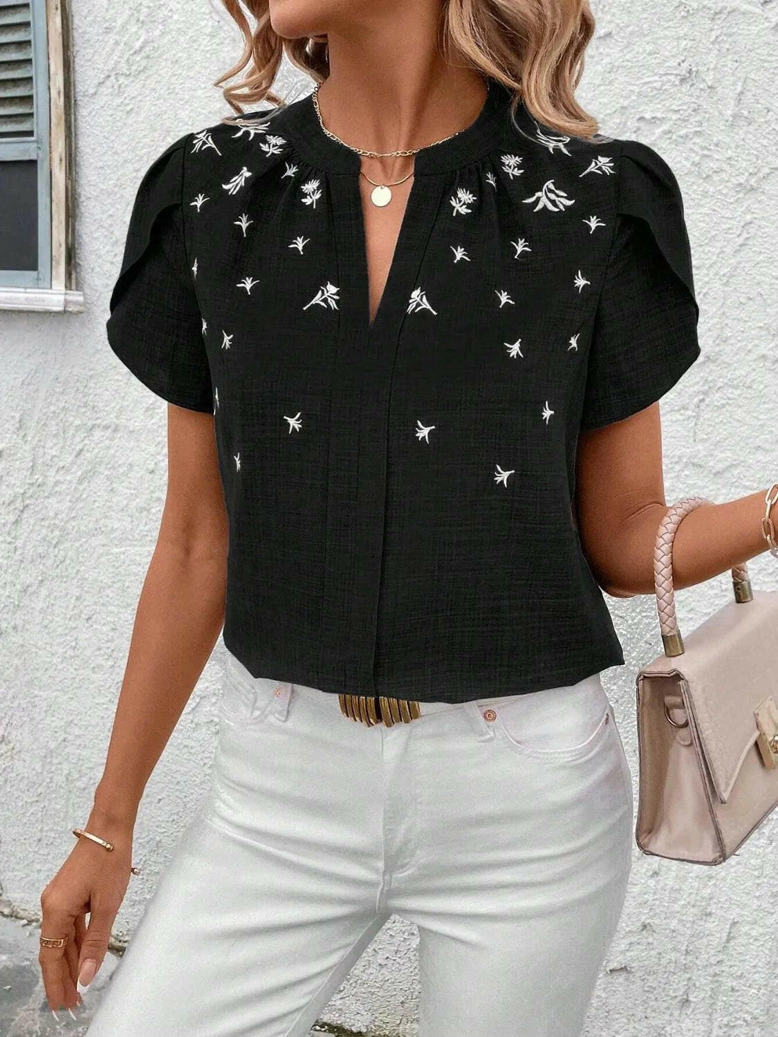 Floral Notched Short Sleeve Blouse.