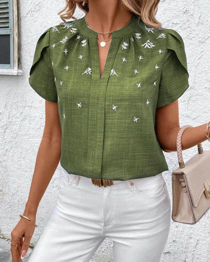 Floral Notched Short Sleeve Blouse.