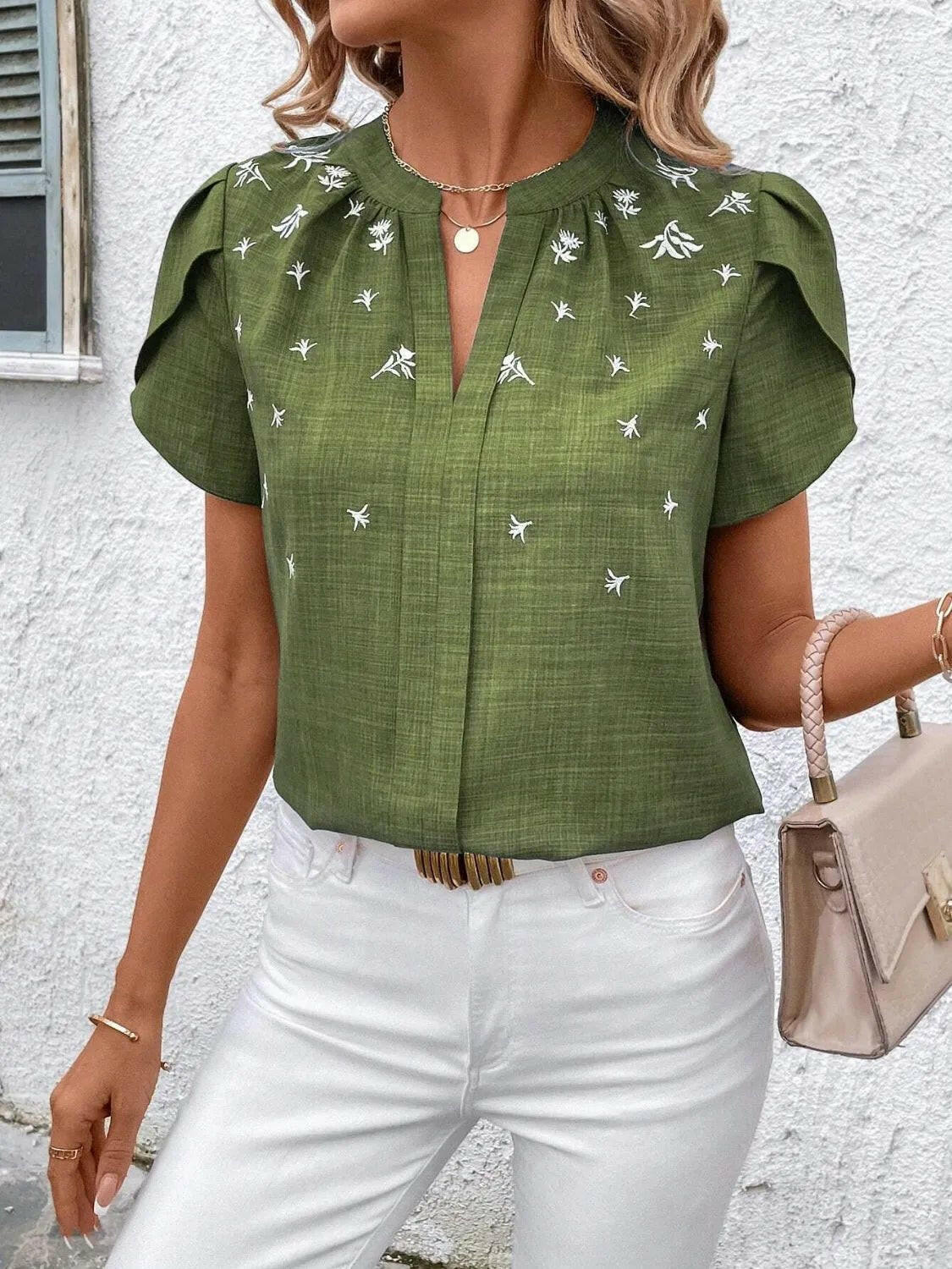 Floral Notched Short Sleeve Blouse.