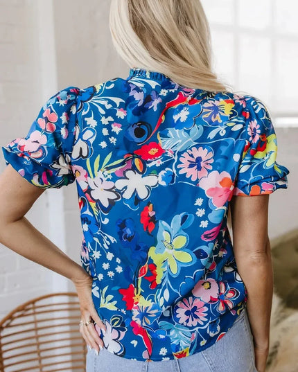 Flowy Floral Blouse with Ruffle Sleeves.