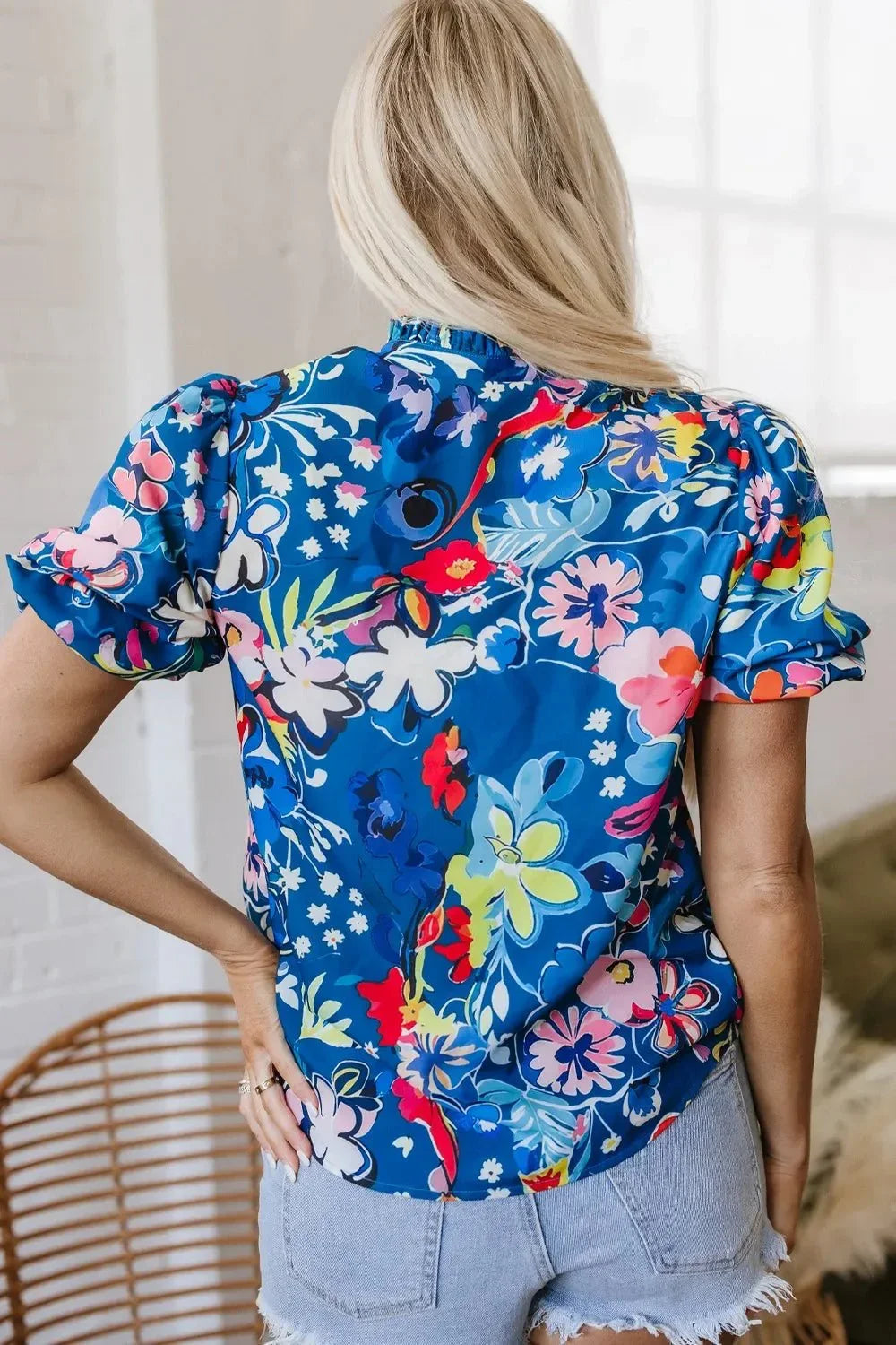 Flowy Floral Blouse with Ruffle Sleeves.