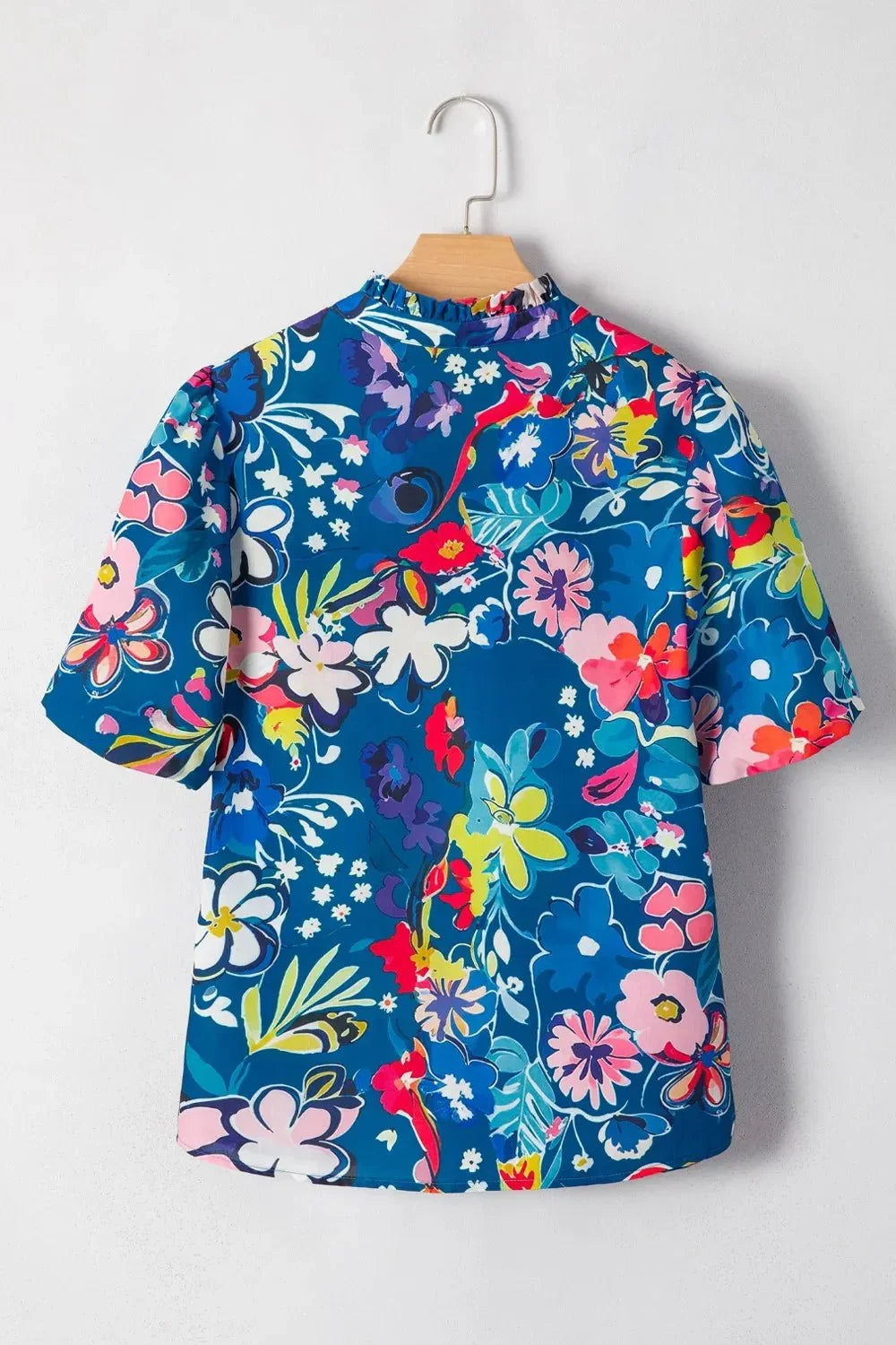 Flowy Floral Blouse with Ruffle Sleeves.