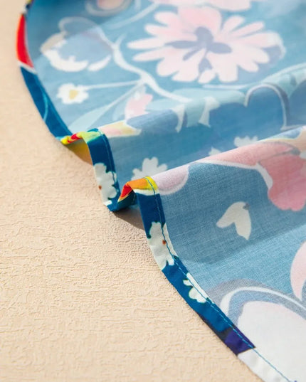 Flowy Floral Blouse with Ruffle Sleeves.