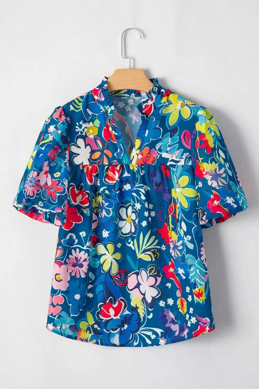 Flowy Floral Blouse with Ruffle Sleeves.