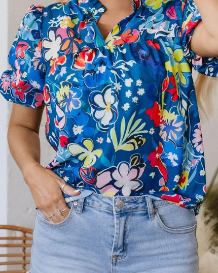 Flowy Floral Blouse with Ruffle Sleeves.