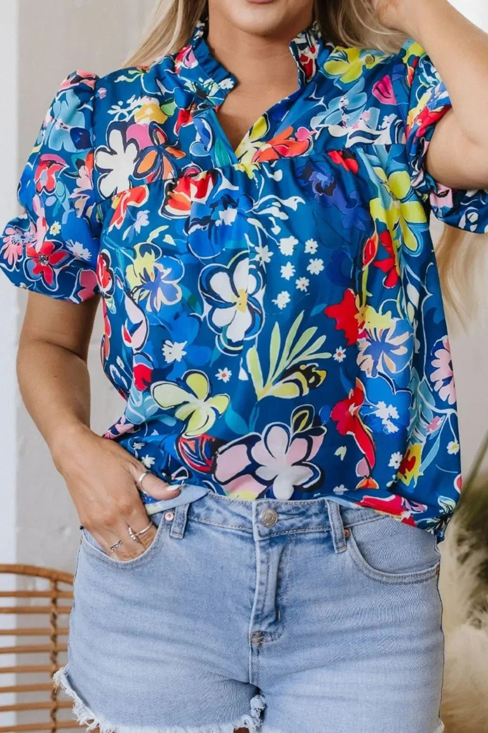 Flowy Floral Blouse with Ruffle Sleeves.