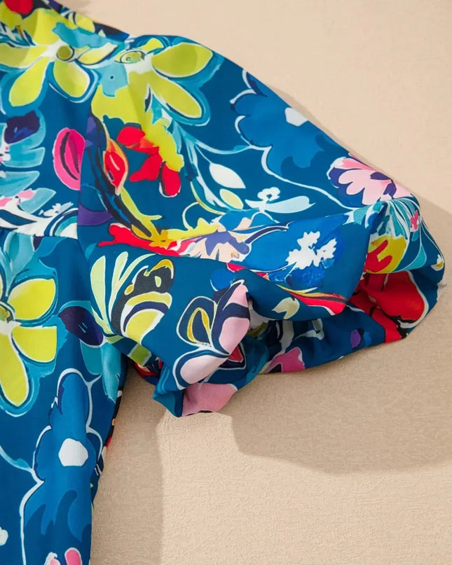 Flowy Floral Blouse with Ruffle Sleeves.