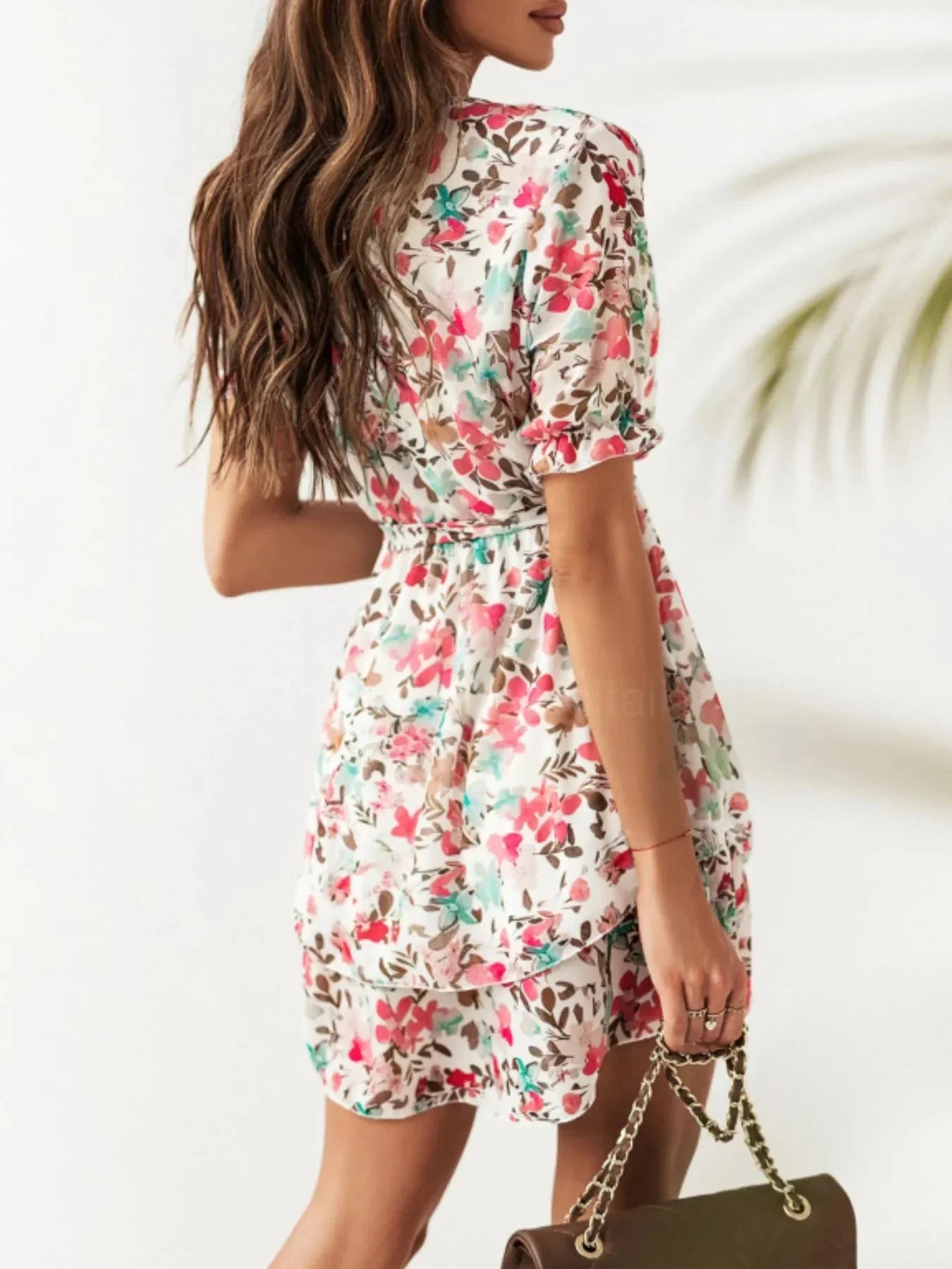 Layered Floral Mini Dress with Playful Ruffle Hem.