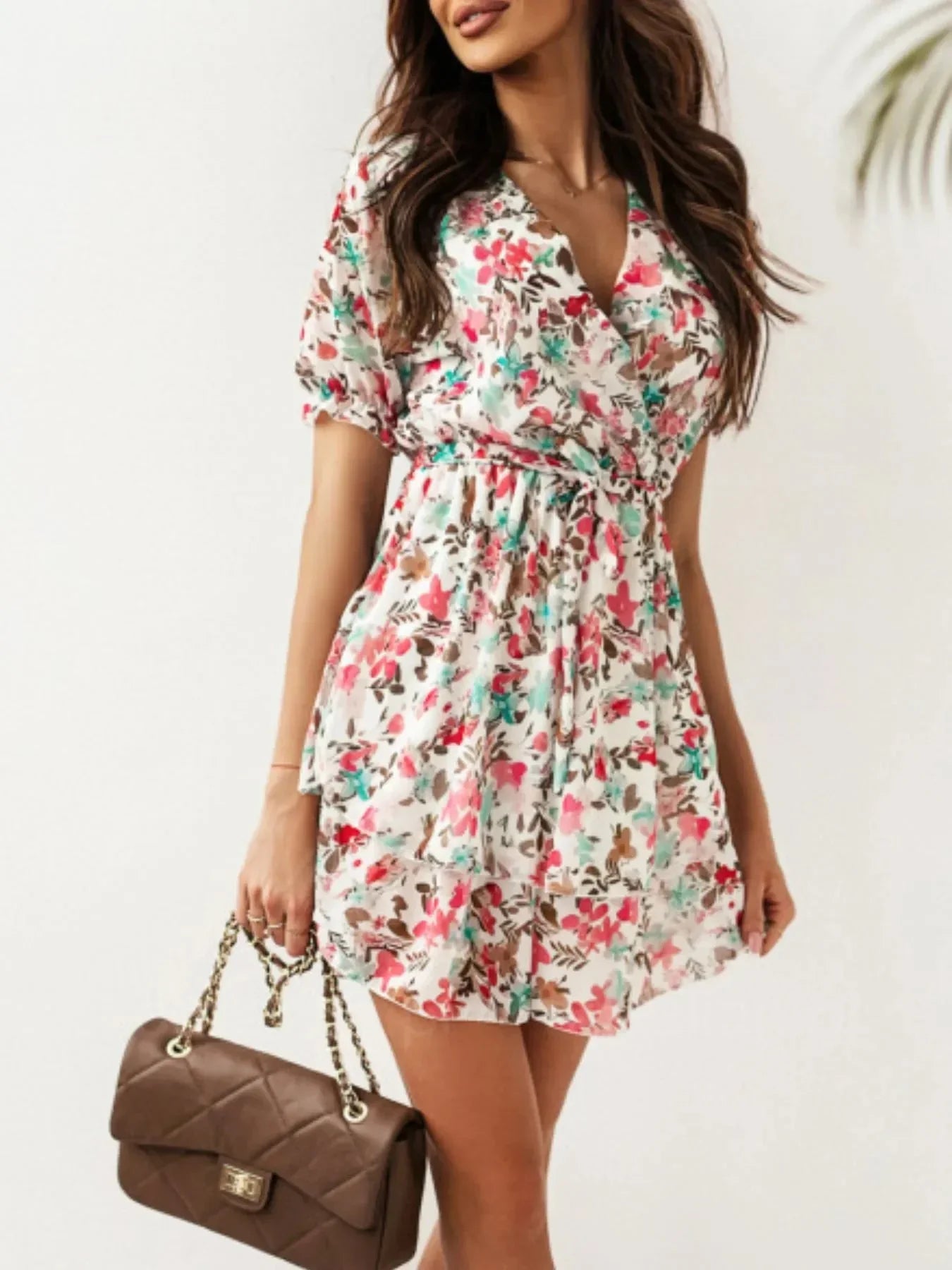 Layered Floral Mini Dress with Playful Ruffle Hem.