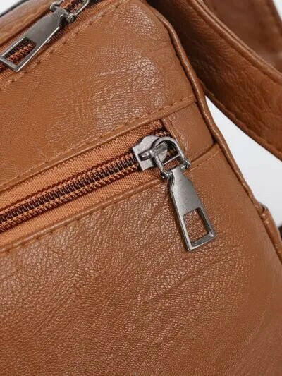 Multi-Compartment Crossbody Bag.