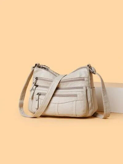 Multi-Compartment Crossbody Bag.