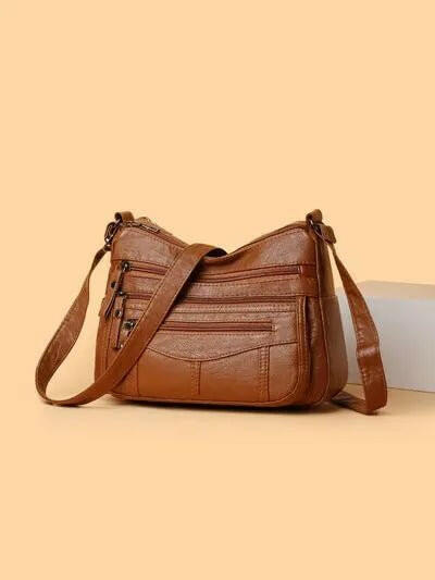 Multi-Compartment Crossbody Bag.