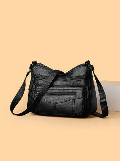 Multi-Compartment Crossbody Bag.