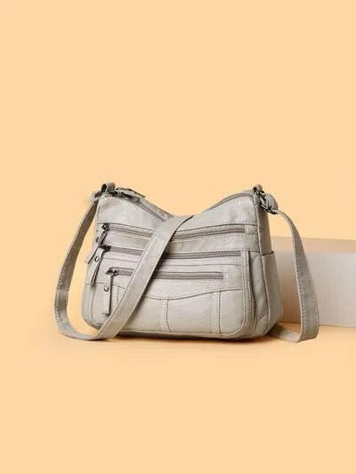 Multi-Compartment Crossbody Bag.