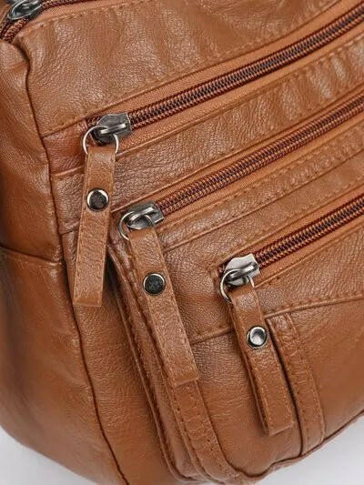 Multi-Compartment Crossbody Bag.