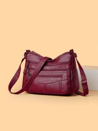 Multi-Compartment Crossbody Bag.