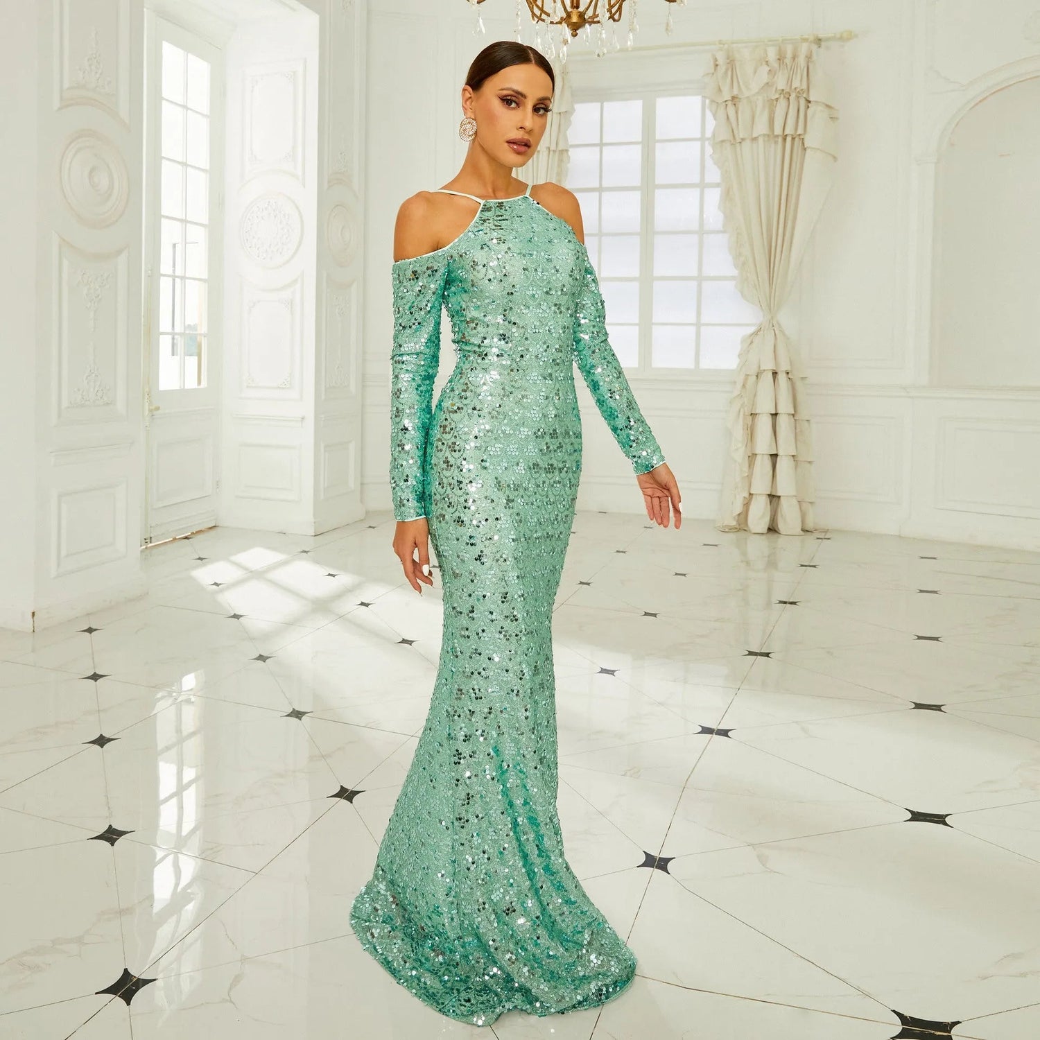 Off-Shoulder Sequin Fishtail Gown with Long Sleeves.