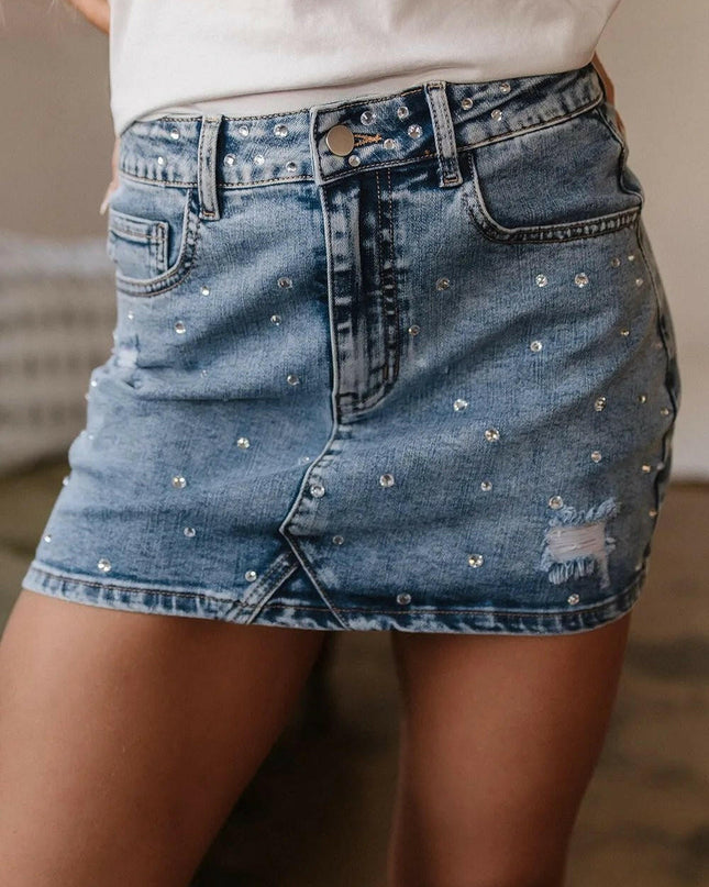 Rhinestone Distressed Denim Mini Skirt.