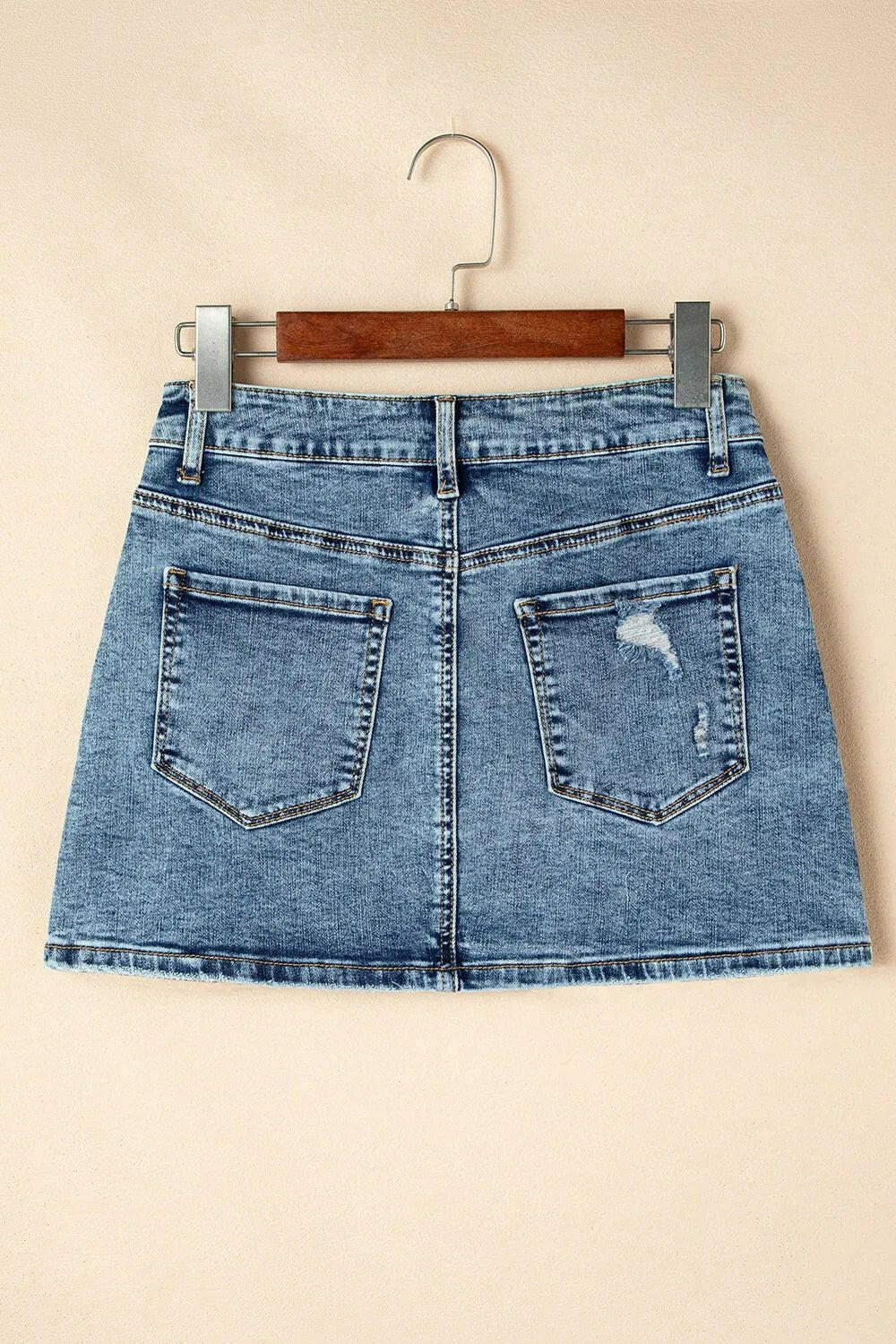 Rhinestone Distressed Denim Mini Skirt.