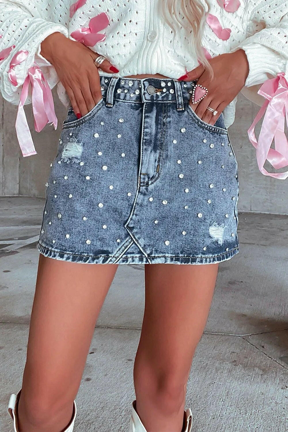 Rhinestone Distressed Denim Mini Skirt.