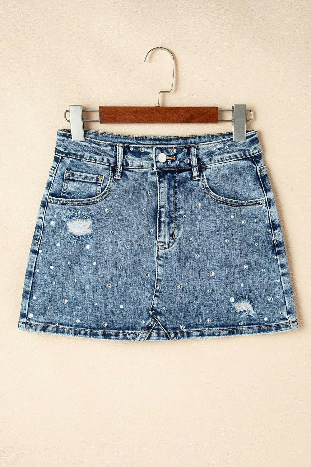 Rhinestone Distressed Denim Mini Skirt.