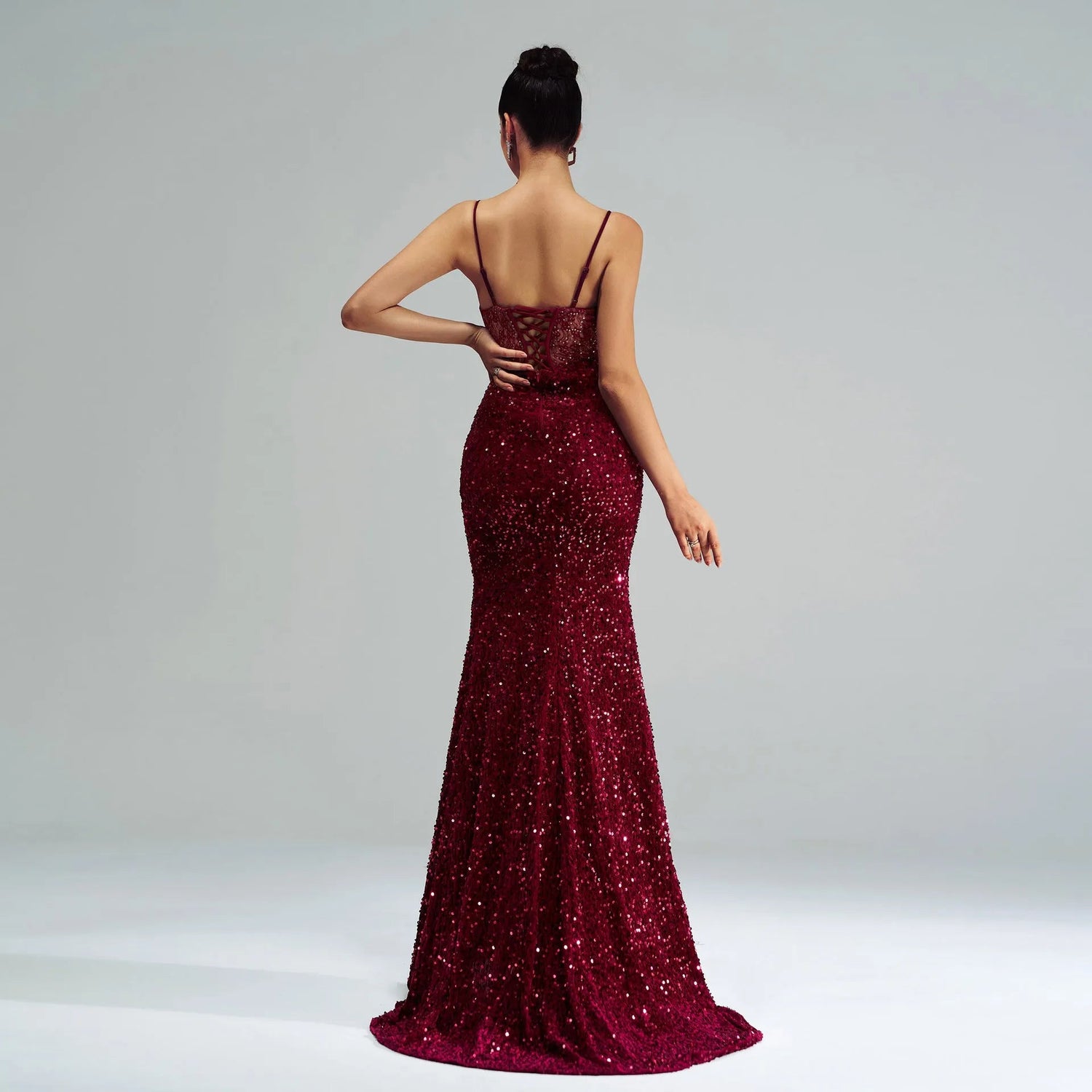 Sequin Slit Evening Gown with Spaghetti Straps.