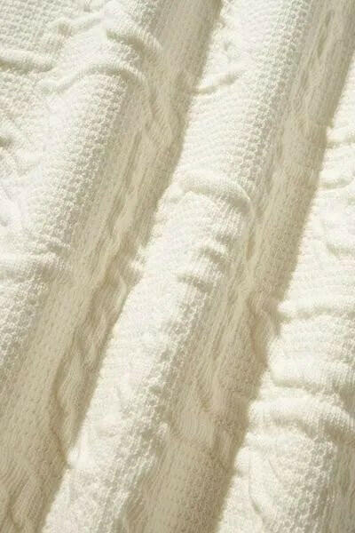 Textured Round Neck Long Sleeve Sweatshirt.